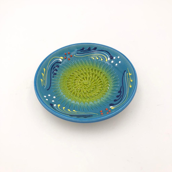 Garlic Grater Plate. Spain #Ref 23 Handmade and Hand Painted in Cordoba White Plate with Orange and Red Circle and Green Rim Daisy Chain Pattern. 